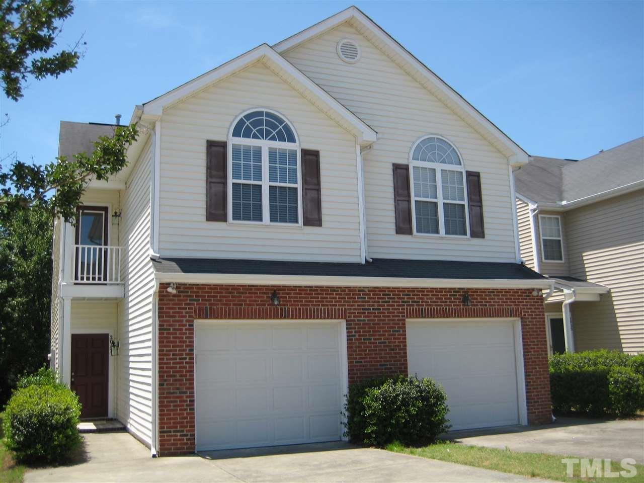 2017 Metacomet Way Raleigh, NC 27604 - Photo 1 of 15 a front view of a house with a yard
