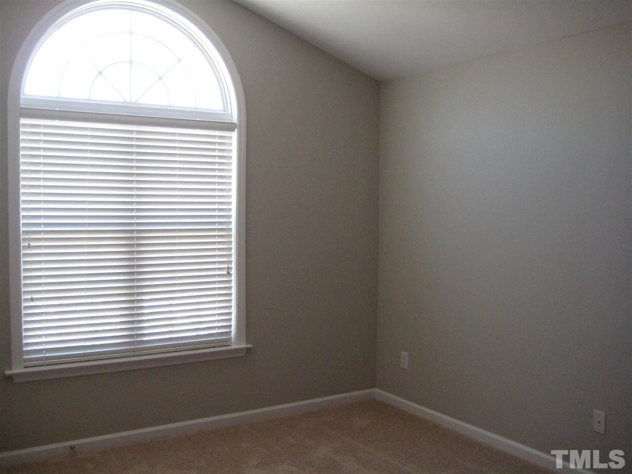 2017 Metacomet Way Raleigh, NC 27604 - Photo 9 of 15 an empty room with a window