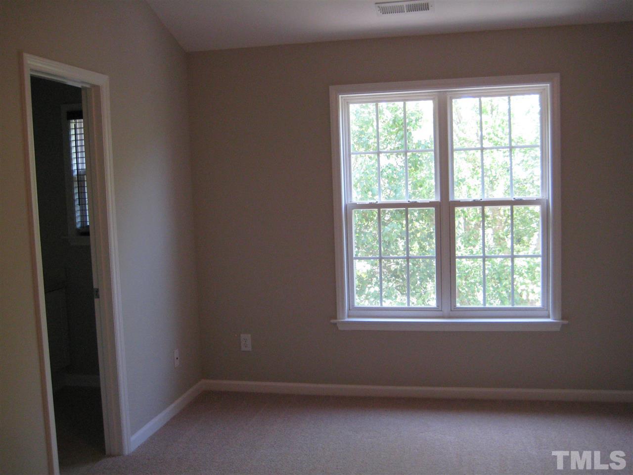 2017 Metacomet Way Raleigh, NC 27604 - Photo 10 of 15 an empty room with a window