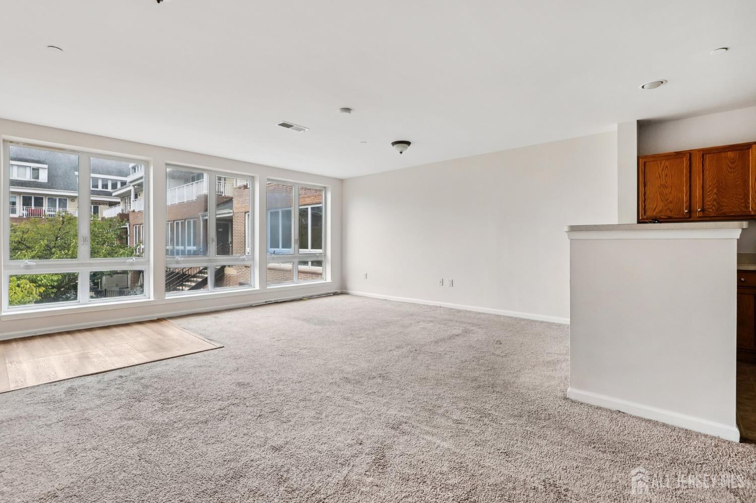 368 Rector Street, Unit 421 Perth Amboy, NJ 08861 - Photo 11 of 37 a view of an empty room with a window