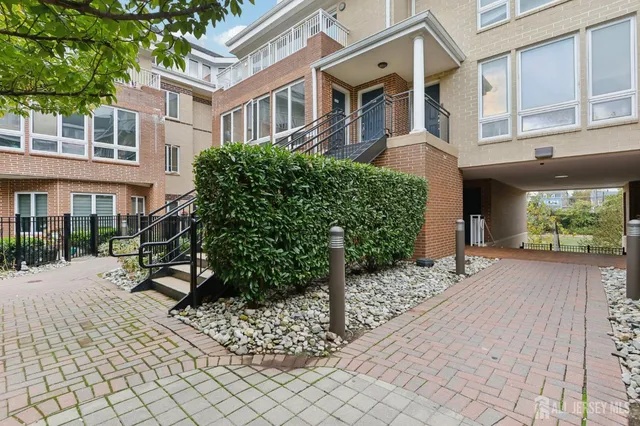 a view of a building with a bench