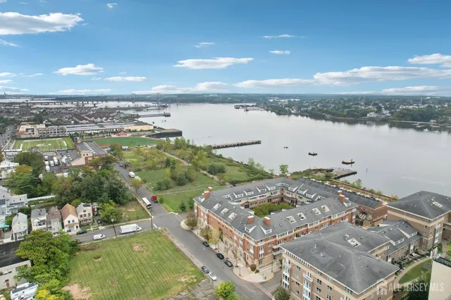 a view of a city with a lake