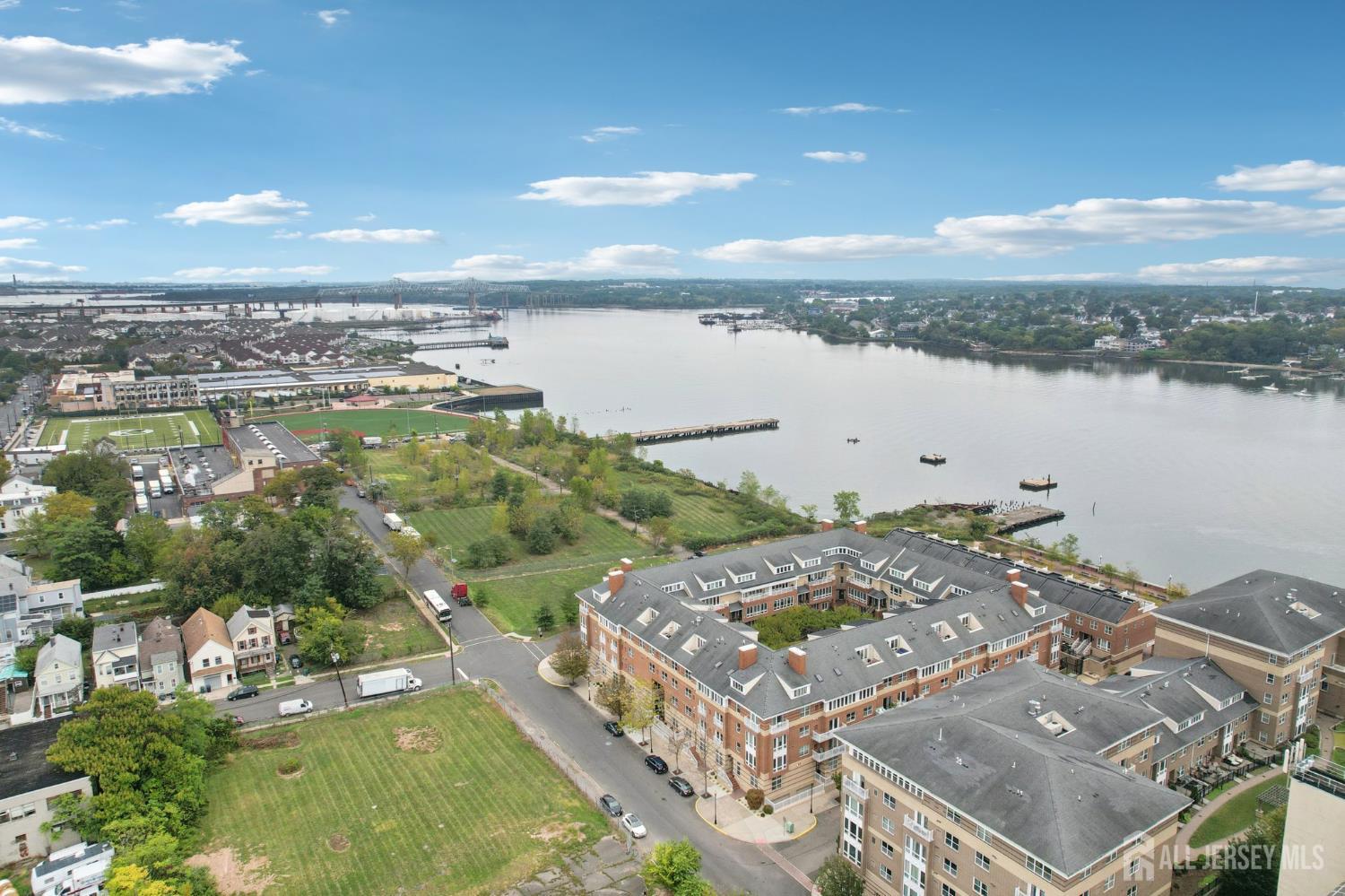 368 Rector Street, Unit 421 Perth Amboy, NJ 08861 - Photo 34 of 37 a view of a lake with houses
