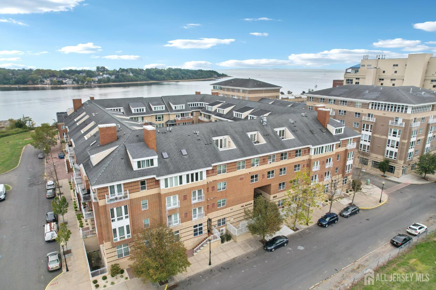 368 Rector Street, Unit 421 Perth Amboy, NJ 08861 - Photo 36 of 37 a view of a city with a lake