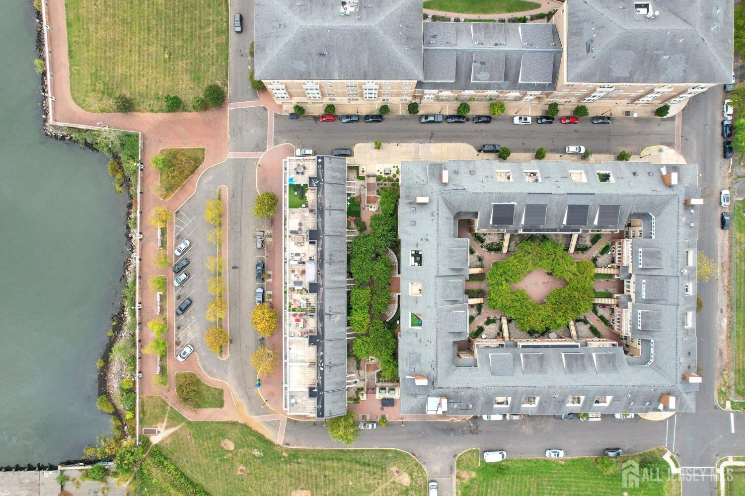 368 Rector Street, Unit 421 Perth Amboy, NJ 08861 - Photo 37 of 37 a picture of a bathroom with a sink and a mirror