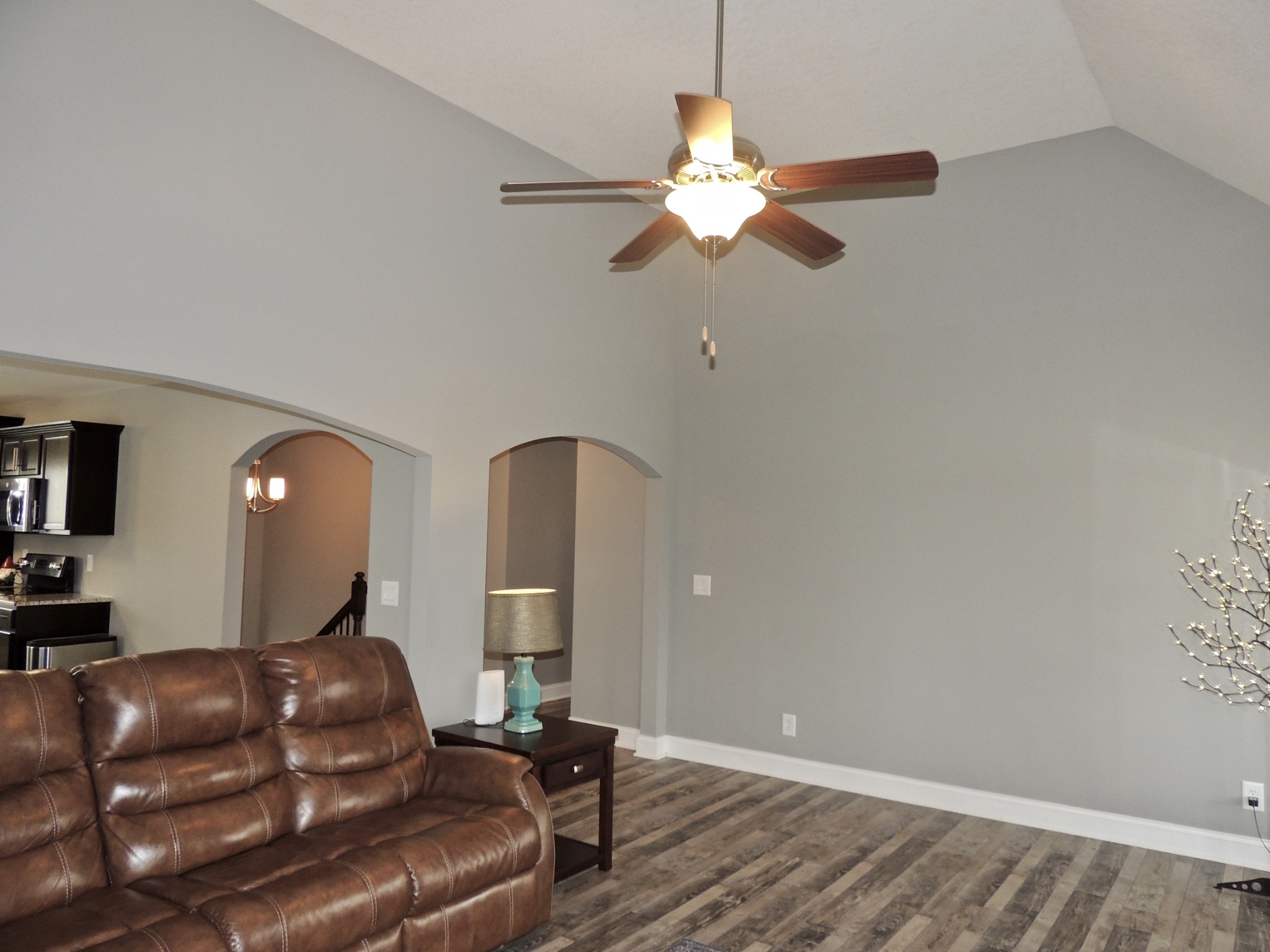 1007 Barnhill Road Clarksville, TN 37043 - Photo 14 of 32 a living room with furniture and a chandelier