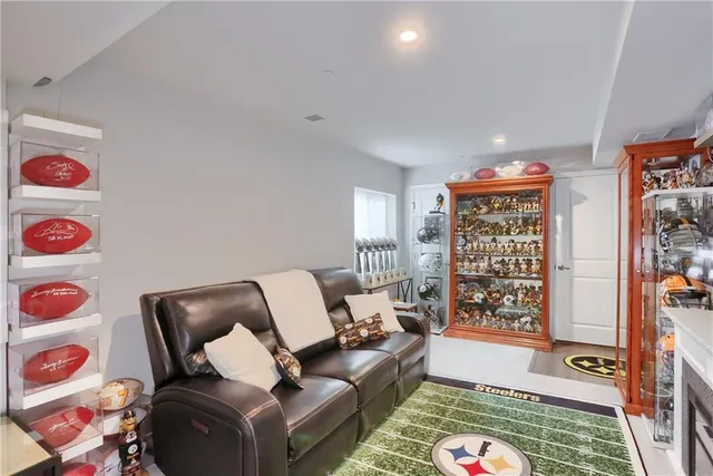 a living room with furniture and a rug