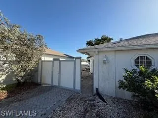 a view of a front of a house with a yard