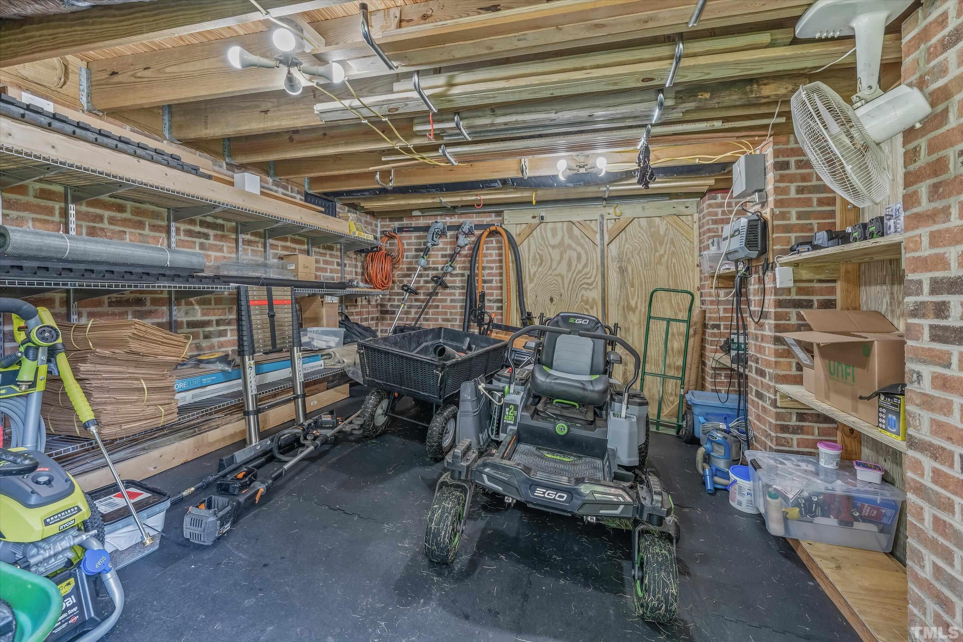 109 Rother Lane Durham, NC 27707 - Photo 21 of 25 a view of a room with gym equipment