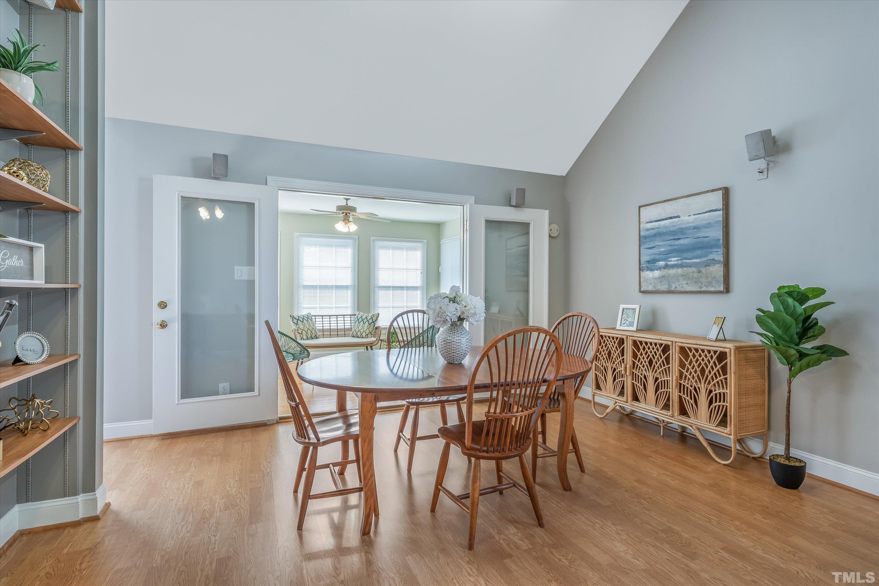 109 Rother Lane Durham, NC 27707 - Photo 7 of 25 a view of a dining room with furniture and wooden floor