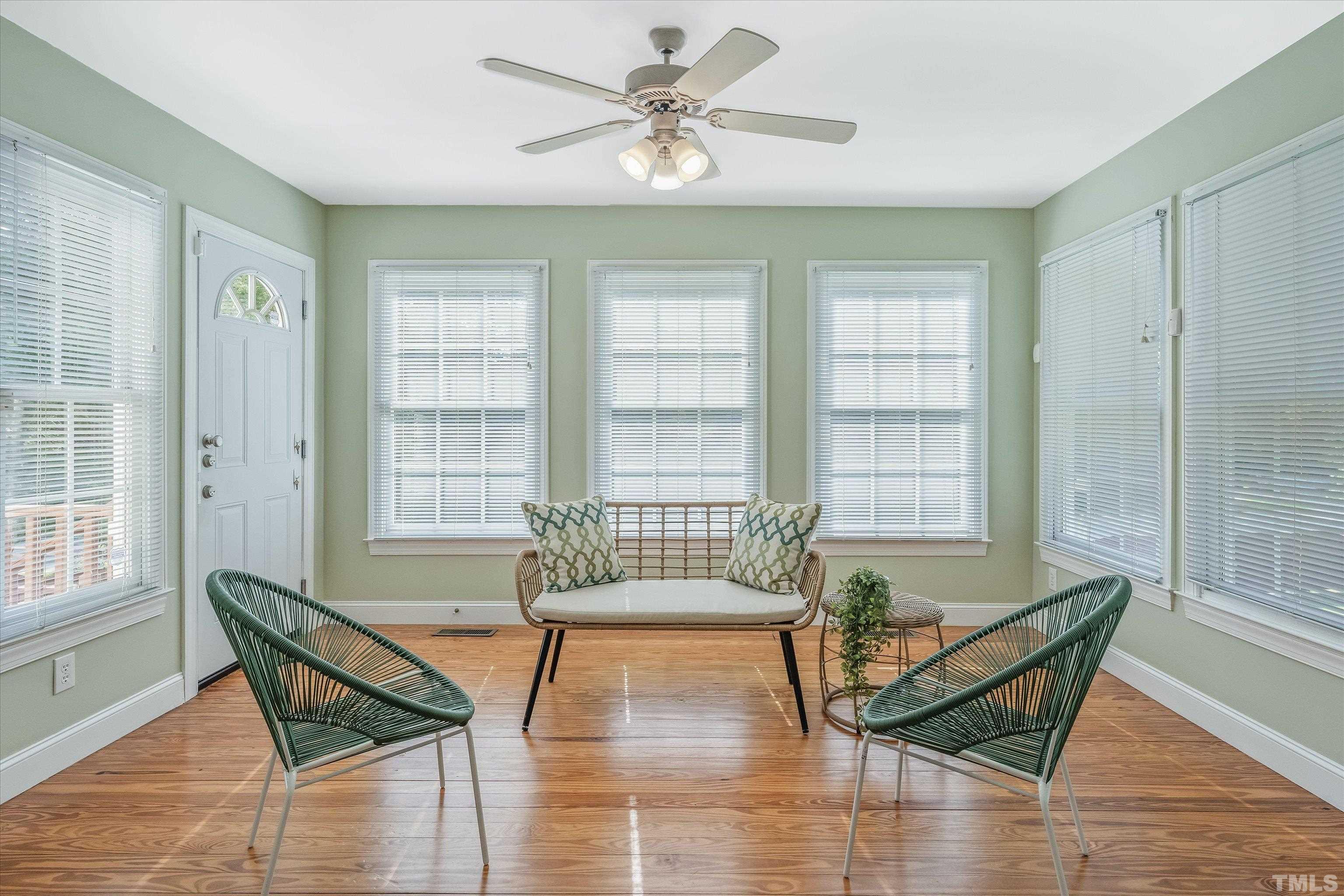 109 Rother Lane Durham, NC 27707 - Photo 8 of 25 a living room with furniture and windows