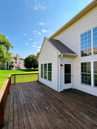 a view of a house with a deck