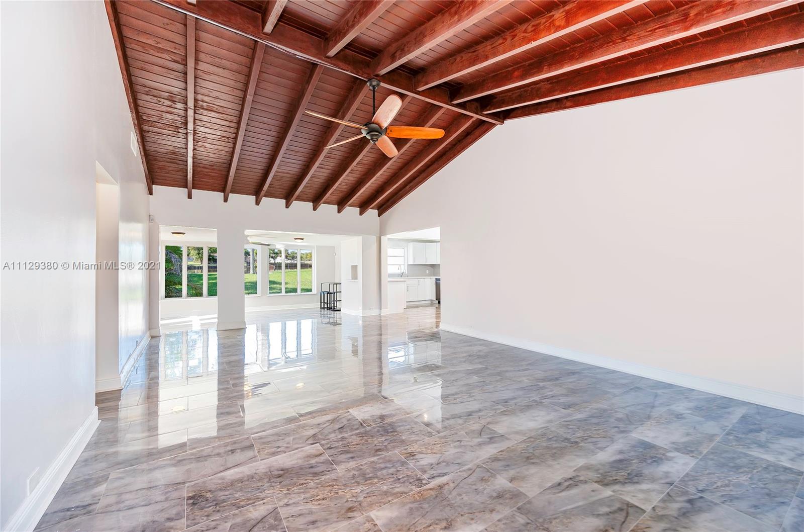 12480 Griffing Boulevard North Miami, FL 33161 - Photo 22 of 31 a view of empty room with wooden floor