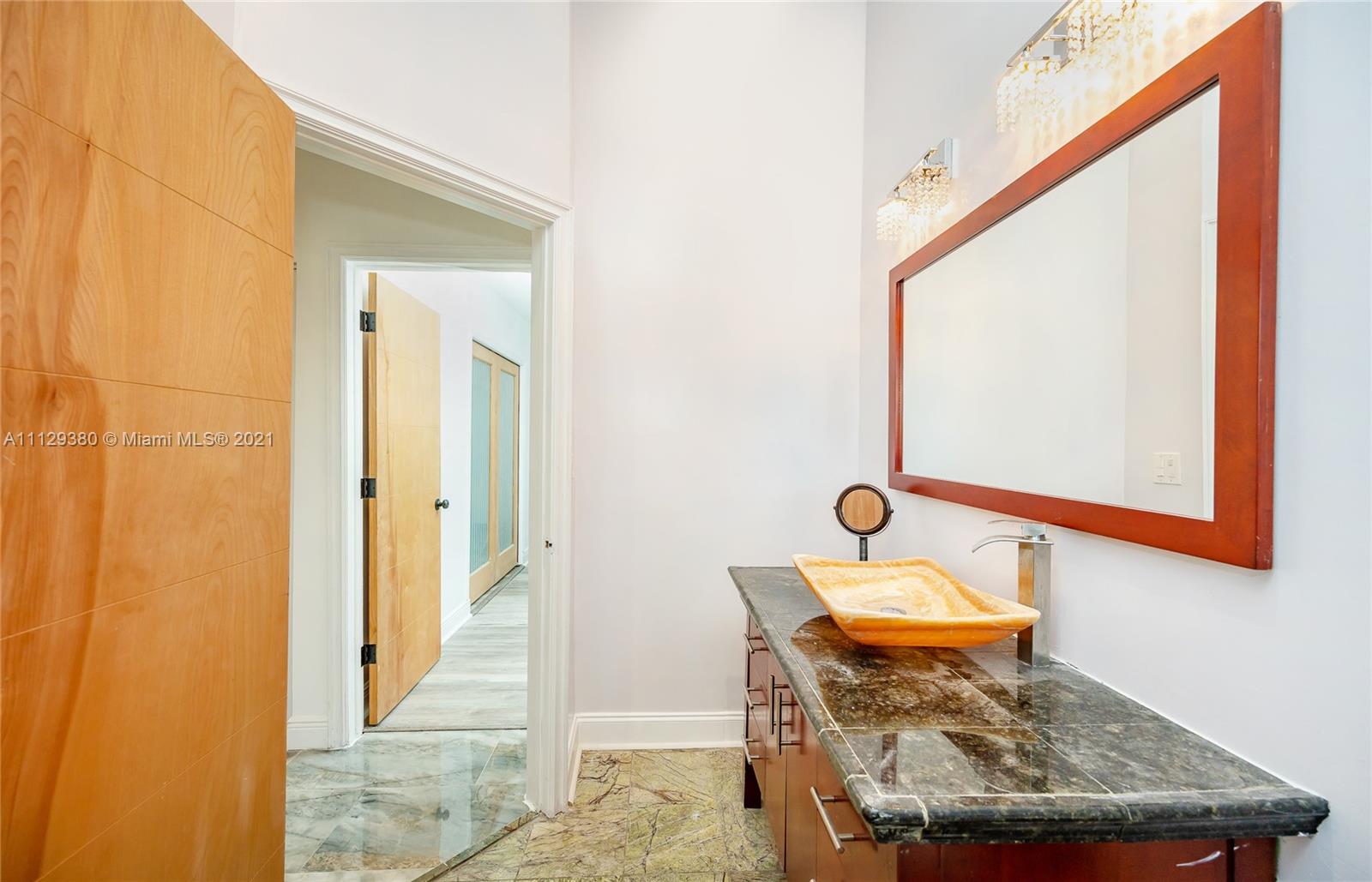 12480 Griffing Boulevard North Miami, FL 33161 - Photo 27 of 31 a room with a table and chairs