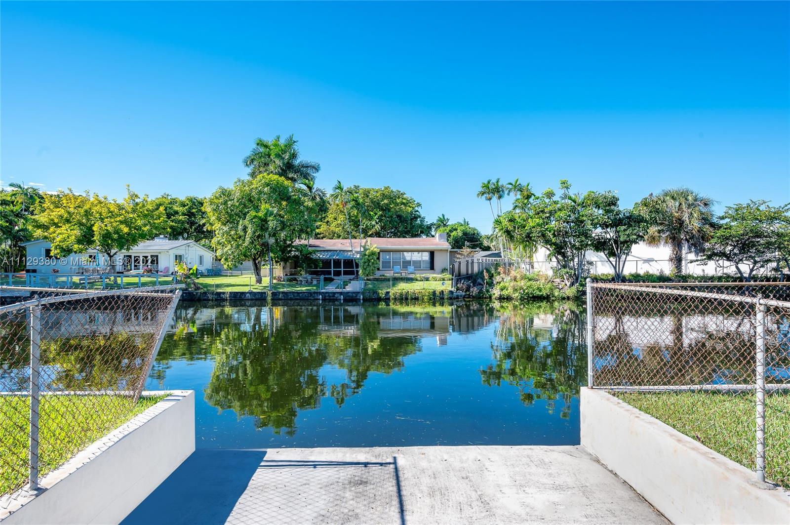 12480 Griffing Boulevard North Miami, FL 33161 - Photo 4 of 31 a view of a lake from a balcony