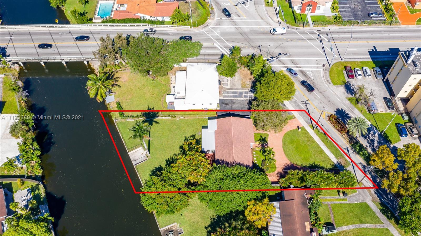 12480 Griffing Boulevard North Miami, FL 33161 - Photo 5 of 31 an aerial view of a tennis ground and a large park