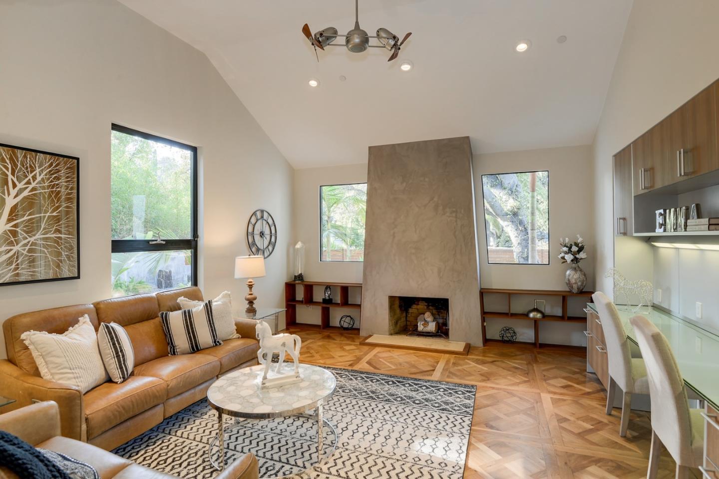 14480 Oak Place Saratoga, CA 95070 - Photo 12 of 45 a living room with furniture and a fireplace