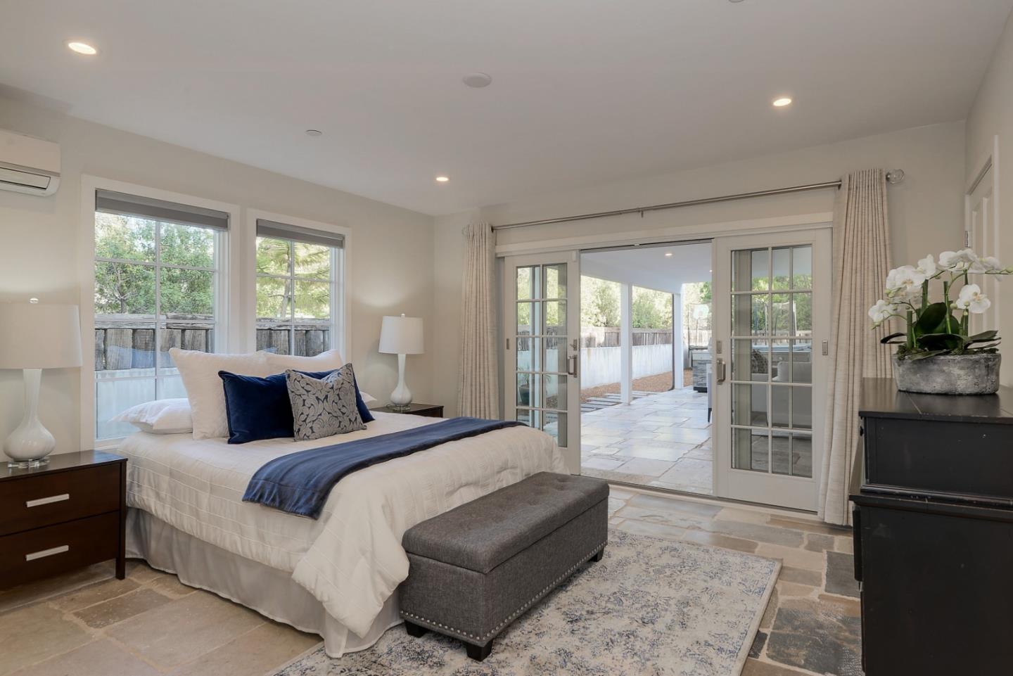 14480 Oak Place Saratoga, CA 95070 - Photo 13 of 45 a bedroom with a large bed and a large window