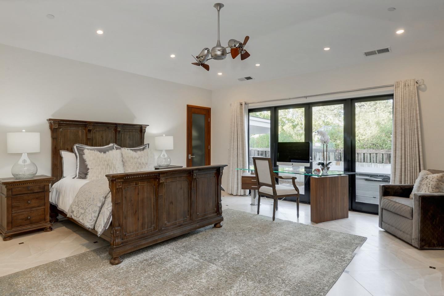 14480 Oak Place Saratoga, CA 95070 - Photo 15 of 45 a living room with furniture and a large window