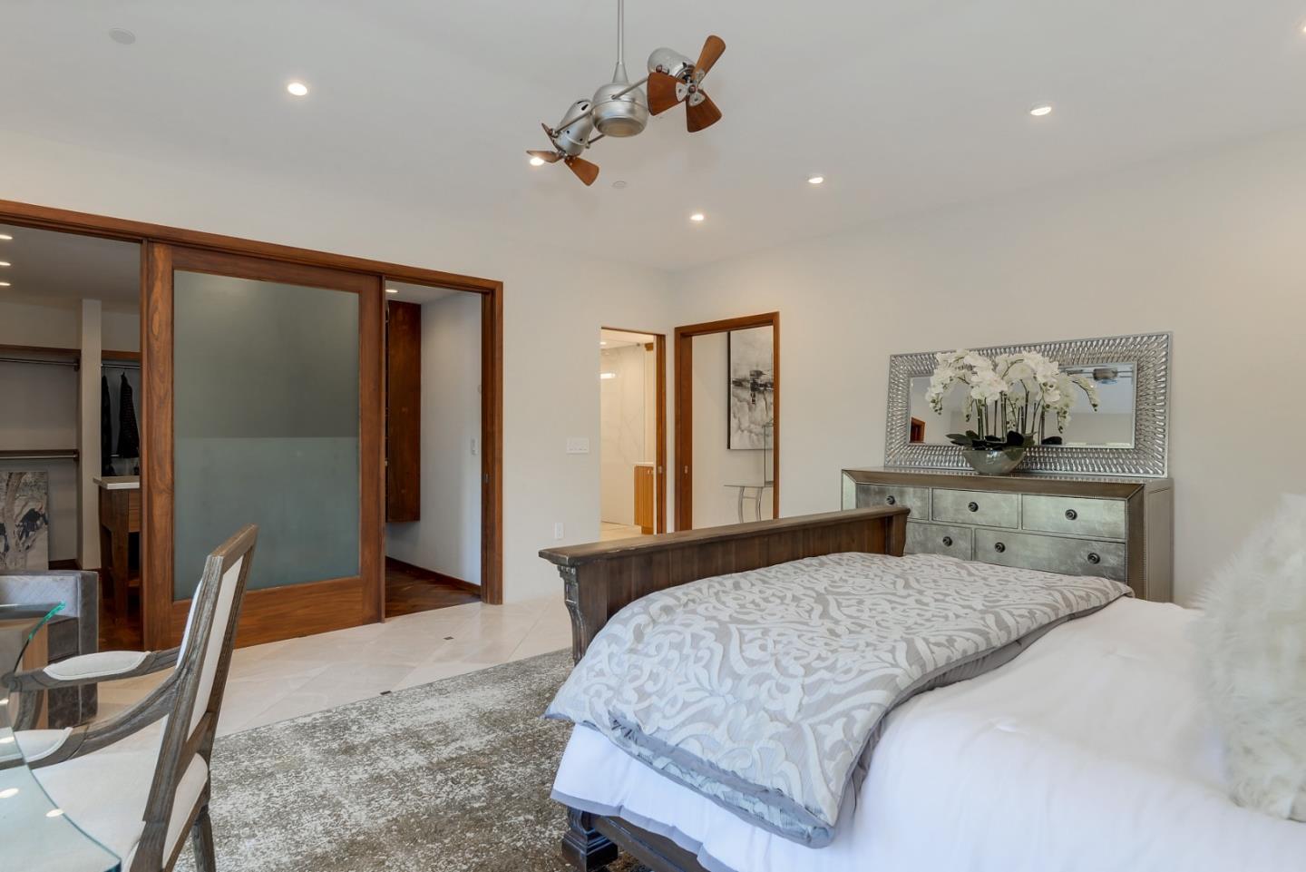 14480 Oak Place Saratoga, CA 95070 - Photo 16 of 45 a bedroom with a bed and furniture