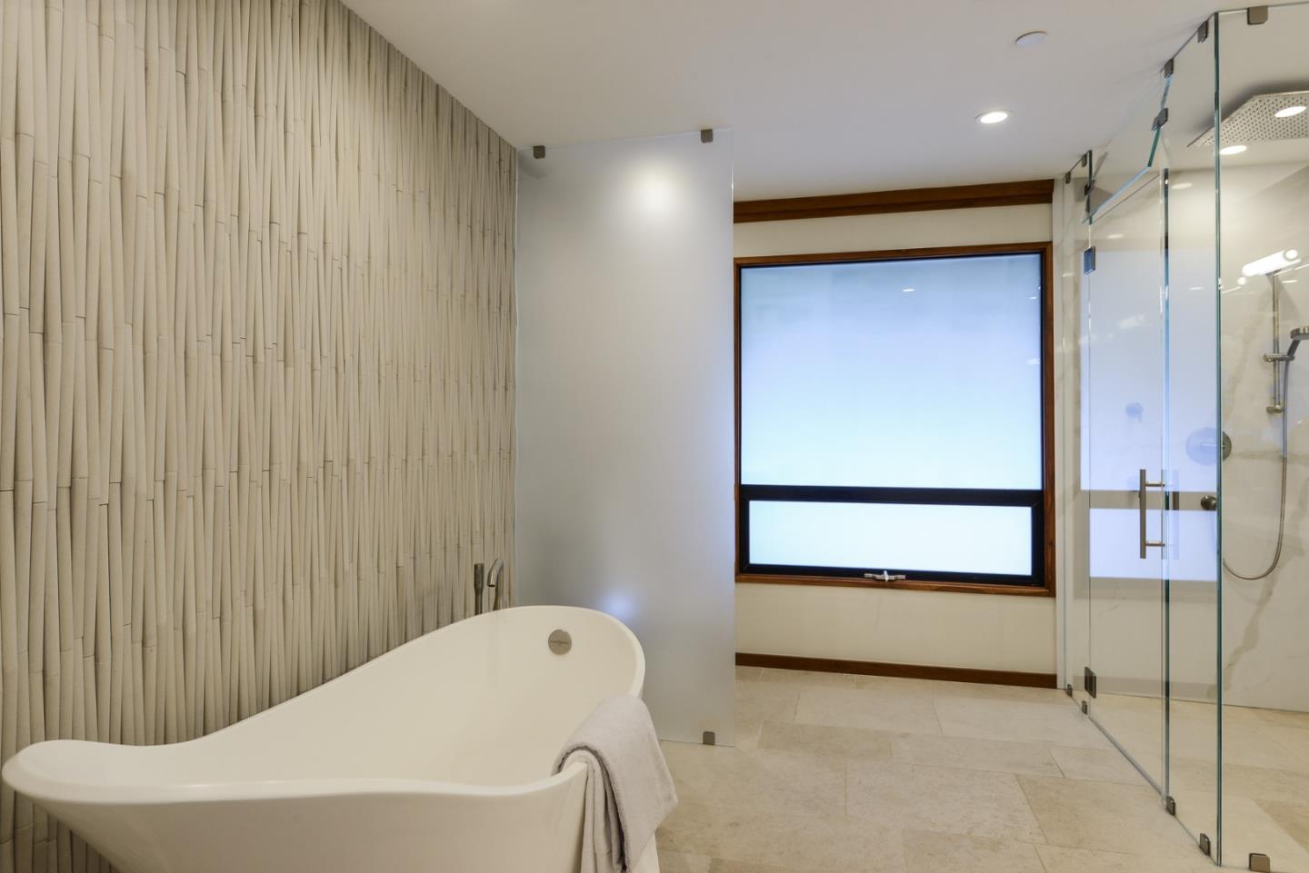 14480 Oak Place Saratoga, CA 95070 - Photo 18 of 45 a bathroom with a tub and shower