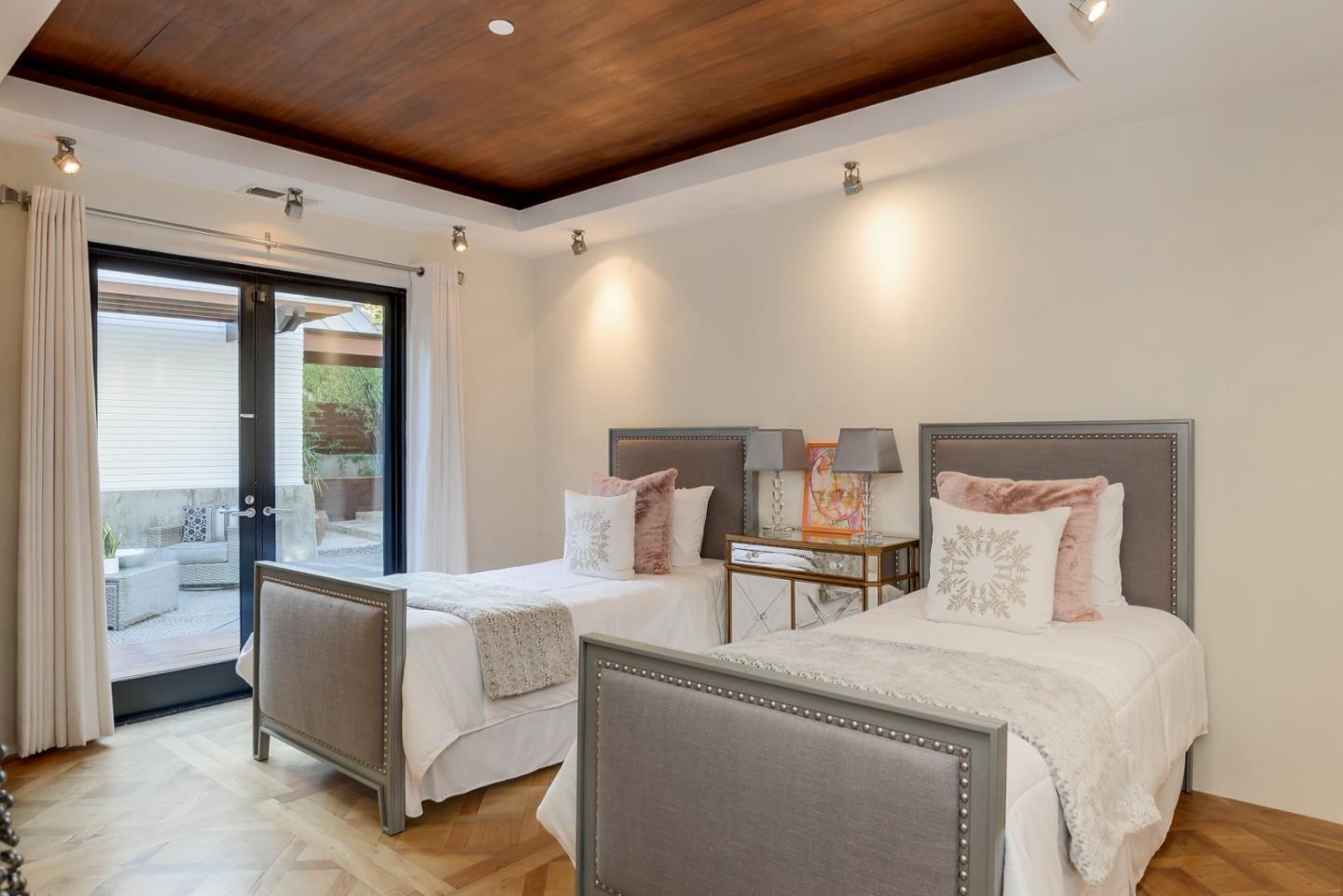 14480 Oak Place Saratoga, CA 95070 - Photo 19 of 45 a bedroom with furniture and white walls