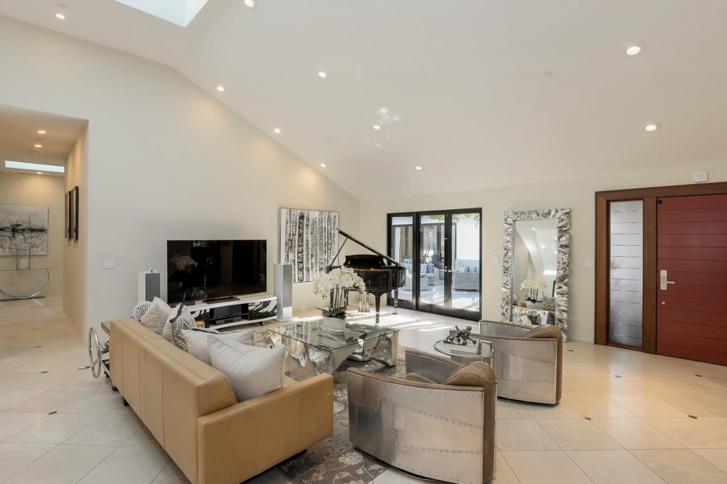 14480 Oak Place Saratoga, CA 95070 - Photo 3 of 45 a living room with furniture and a flat screen tv
