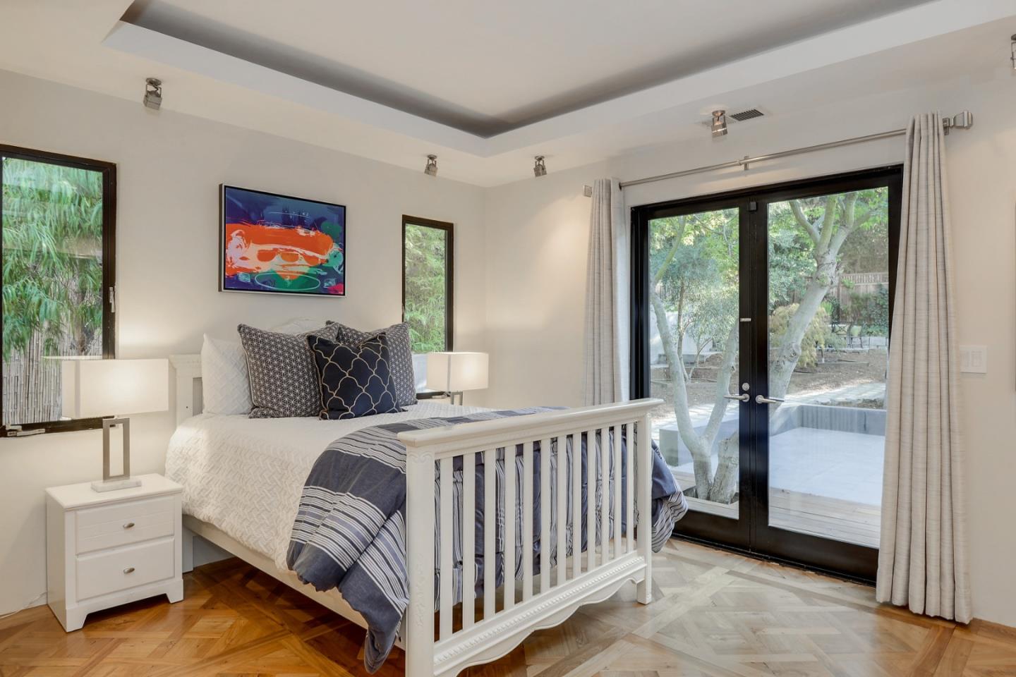 14480 Oak Place Saratoga, CA 95070 - Photo 21 of 45 a bedroom with furniture and a window