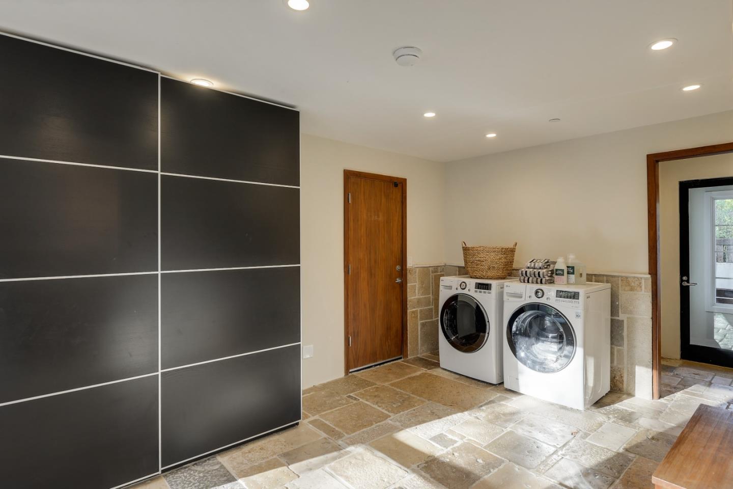14480 Oak Place Saratoga, CA 95070 - Photo 23 of 45 a utility room with dryer and washer