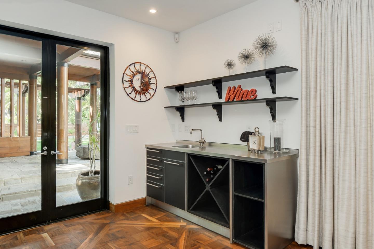 14480 Oak Place Saratoga, CA 95070 - Photo 28 of 45 a view of kitchen island with furniture and wooden floor