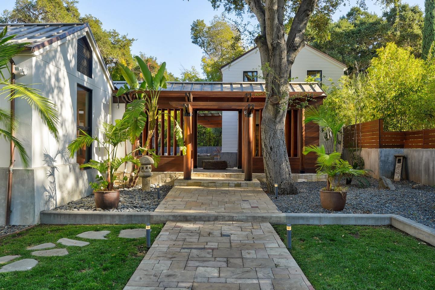 14480 Oak Place Saratoga, CA 95070 - Photo 37 of 45 a front view of a house with garden