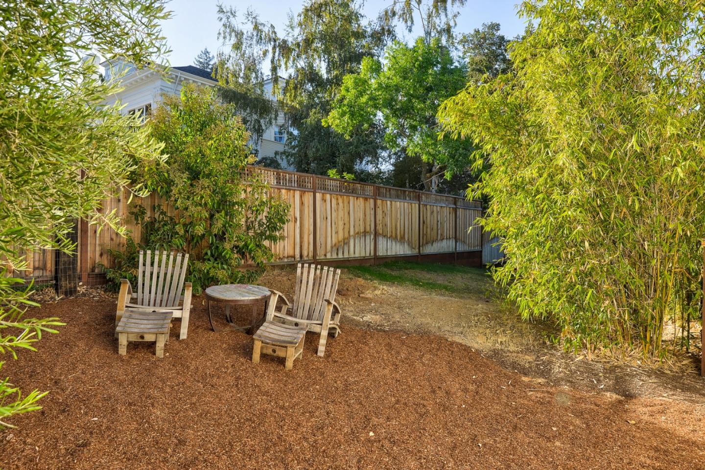 14480 Oak Place Saratoga, CA 95070 - Photo 45 of 45 a lawn chair sitting in a backyard of a house
