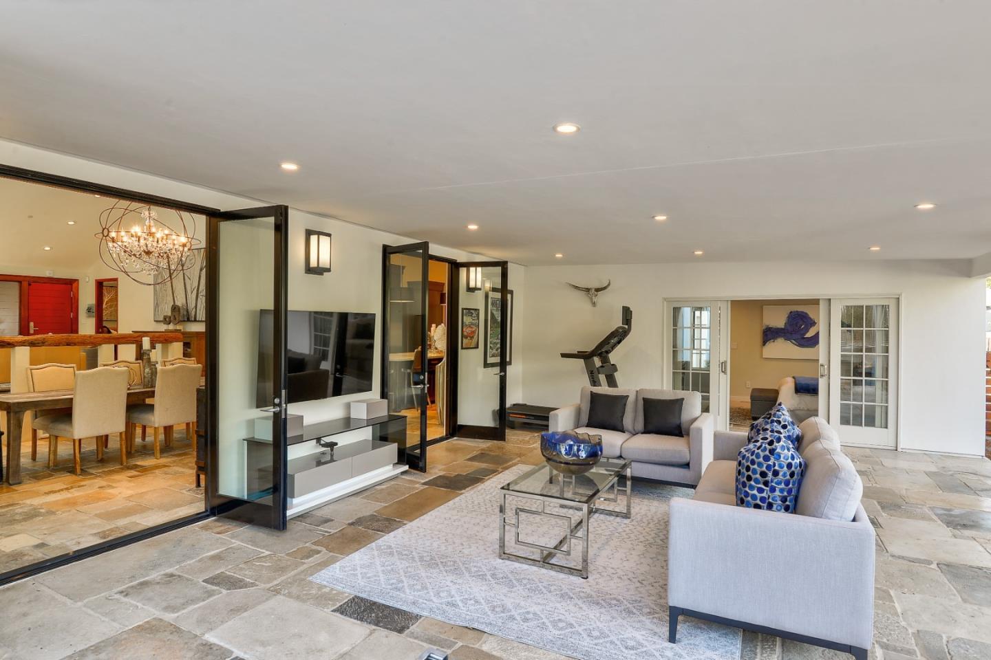 14480 Oak Place Saratoga, CA 95070 - Photo 7 of 45 a living room with furniture and a floor to ceiling window
