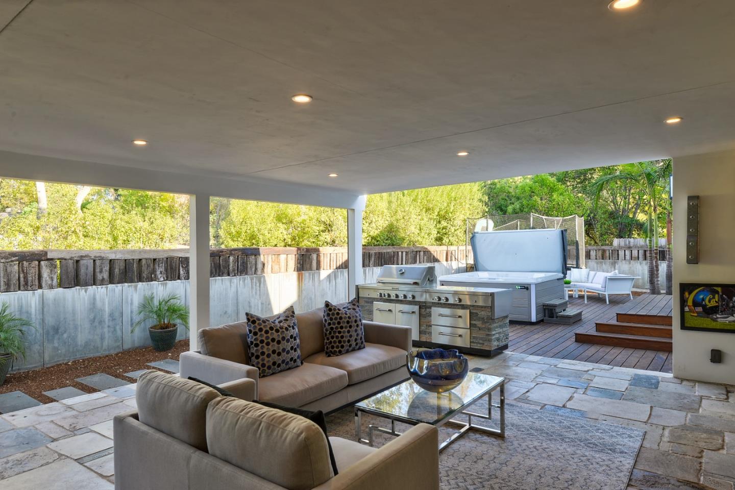 14480 Oak Place Saratoga, CA 95070 - Photo 9 of 45 a living room with furniture and a large window
