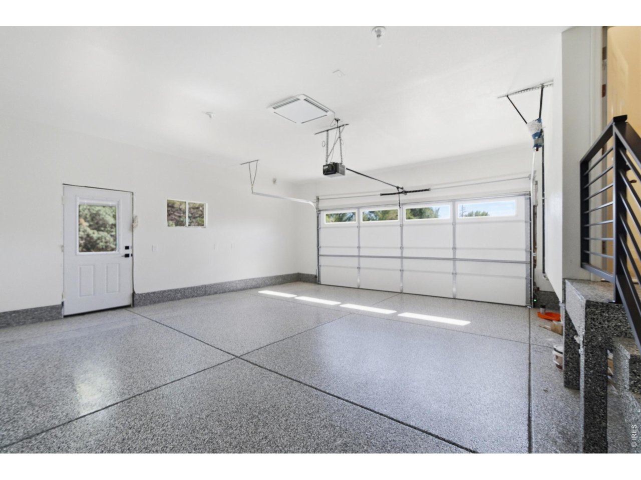 1310 Country Club Road Fort Collins, CO 80524 - Photo 27 of 50 The fully updated garage has a brand new concrete slab, complete with epoxy, and new drywall enclosure.