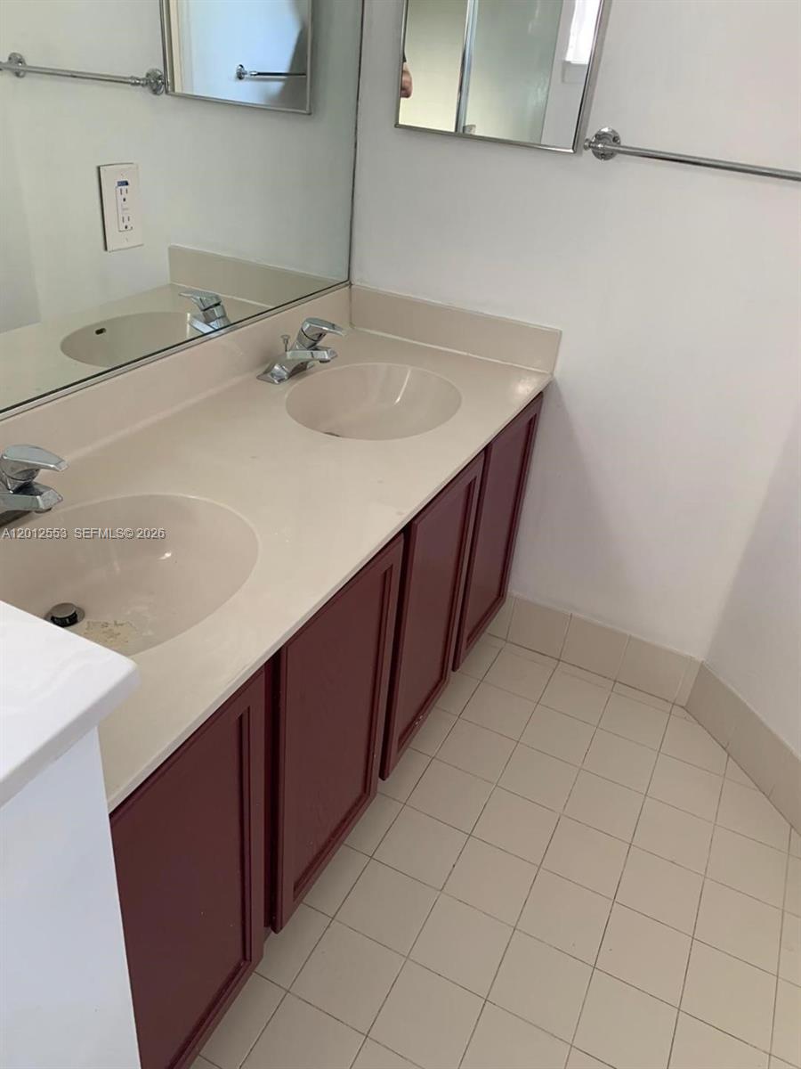6975 Blacksmith Way Lake Worth, FL 33467 - Photo 12 of 21 a kitchen with a sink cabinets and appliances