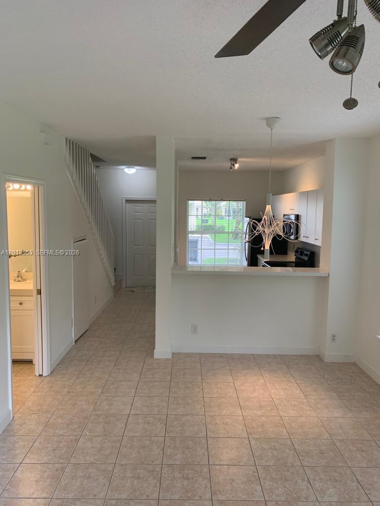 6975 Blacksmith Way Lake Worth, FL 33467 - Photo 8 of 21 a view of a room with window and furniture