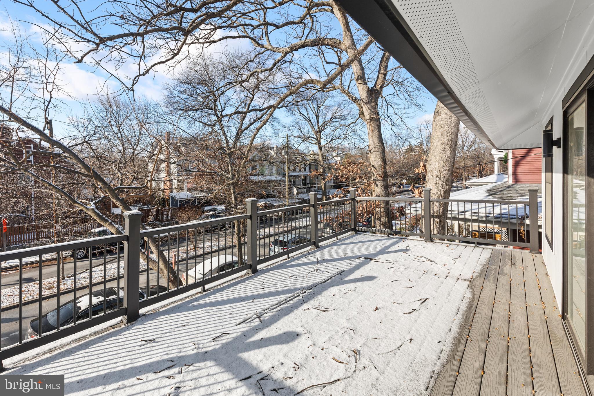 1355 Longfellow Street Northwest Washington, DC 20011 - Photo 23 of 37 a view of a balcony with wooden floor and fence