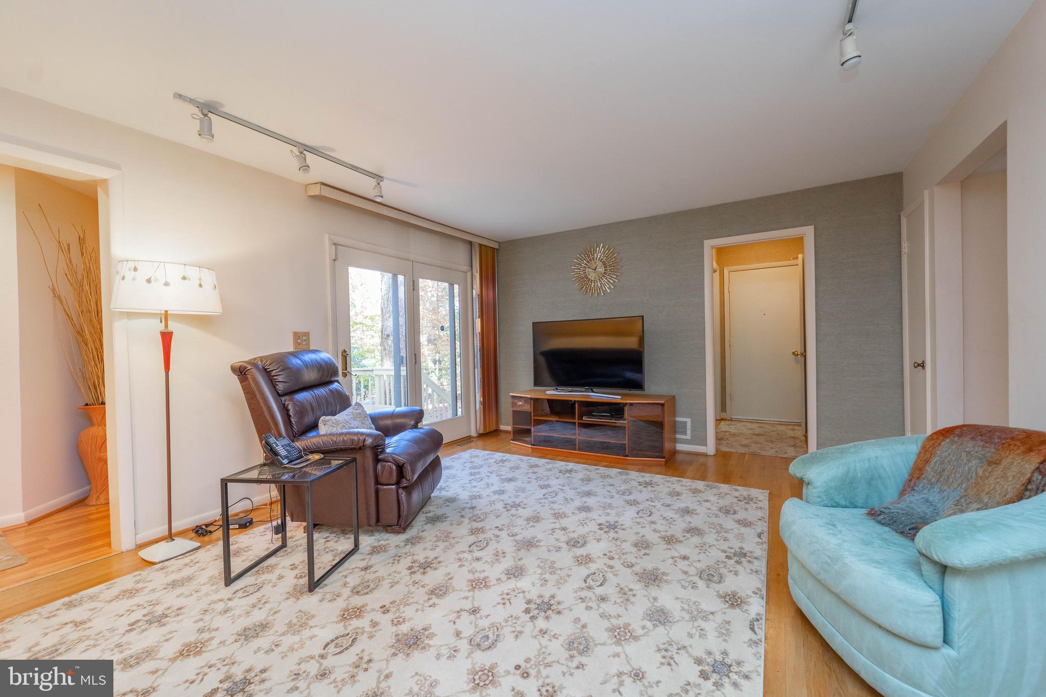 1737 Point Drive, Unit POINT Annapolis, MD 21401 - Photo 11 of 22 a living room with furniture and a flat screen tv