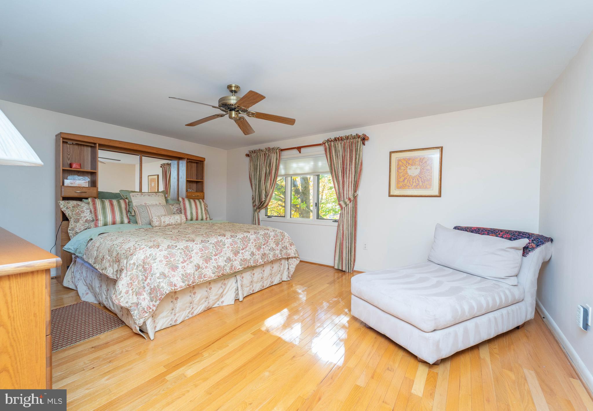 1737 Point Drive, Unit POINT Annapolis, MD 21401 - Photo 15 of 22 a bedroom with a bed couch and window