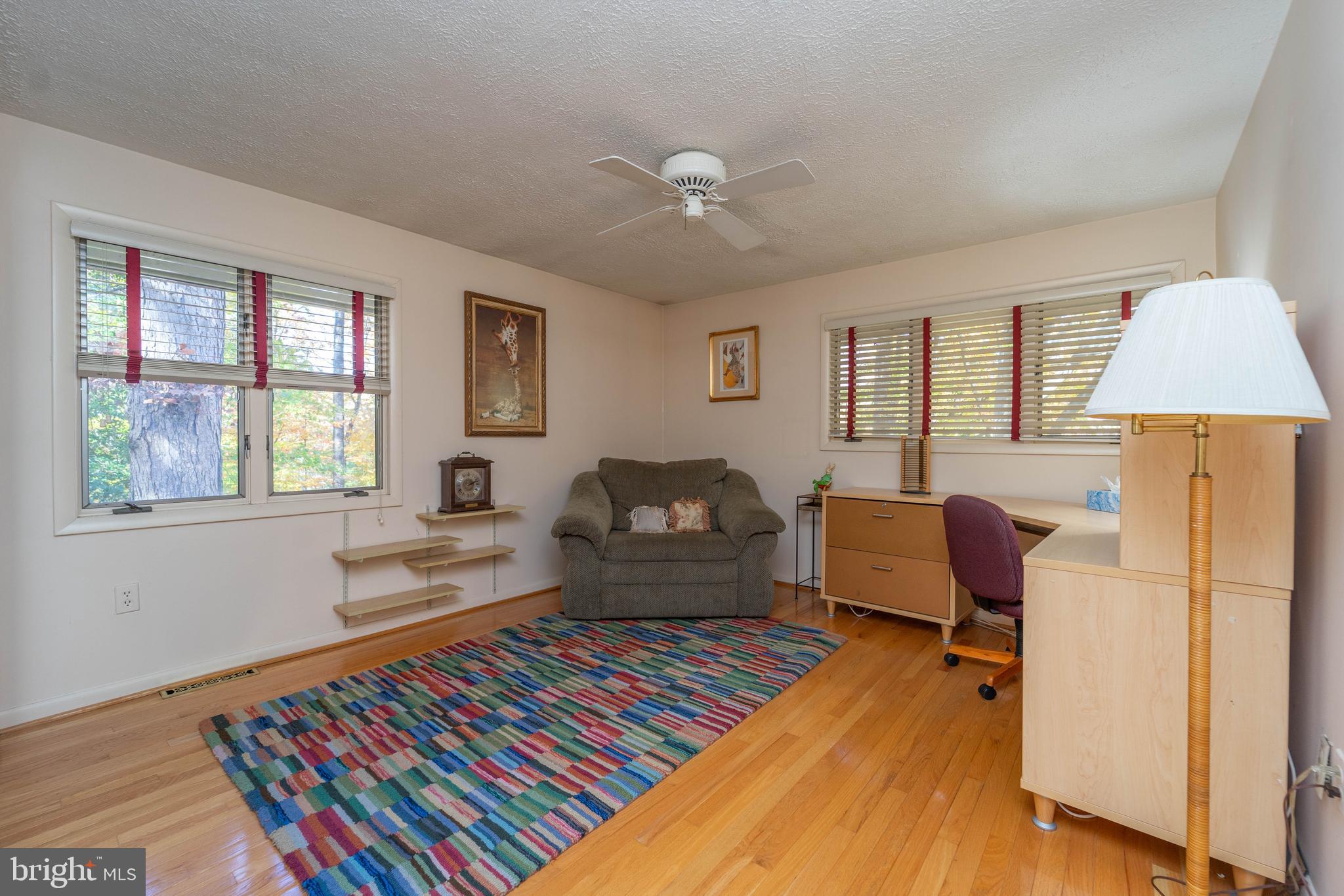 1737 Point Drive, Unit POINT Annapolis, MD 21401 - Photo 17 of 22 a living room with furniture and a rug