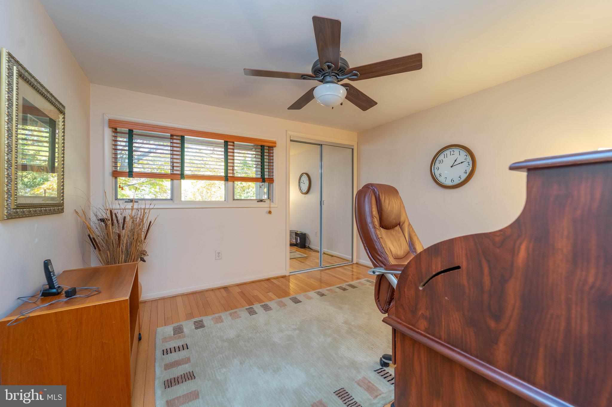 1737 Point Drive, Unit POINT Annapolis, MD 21401 - Photo 18 of 22 a view of a workspace with furniture and a window