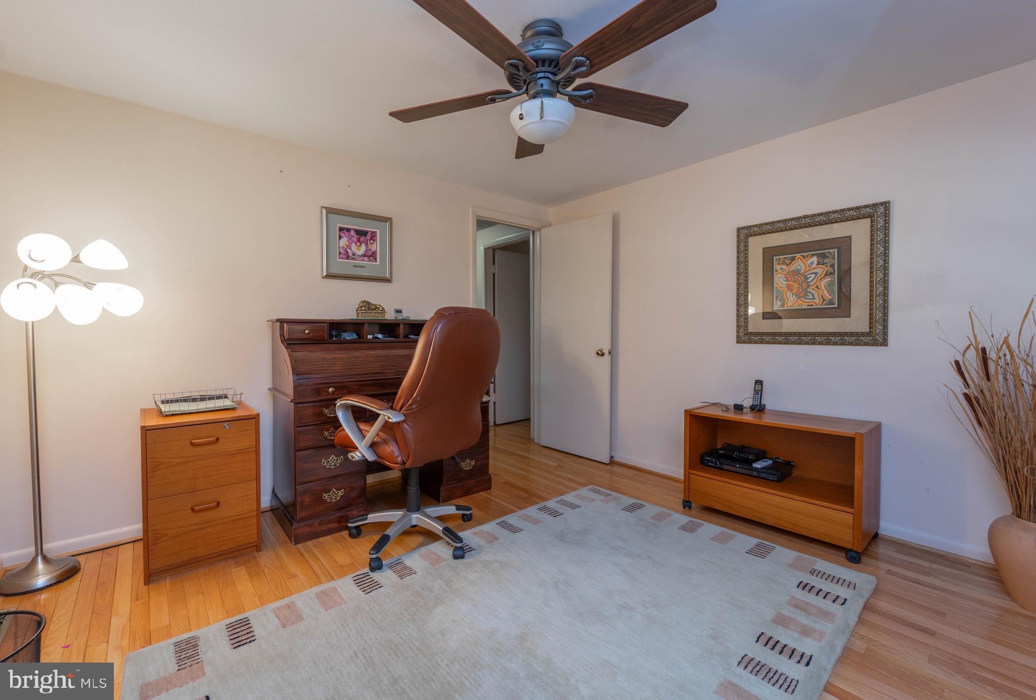 1737 Point Drive, Unit POINT Annapolis, MD 21401 - Photo 19 of 22 a view of a workspace with furniture and a window