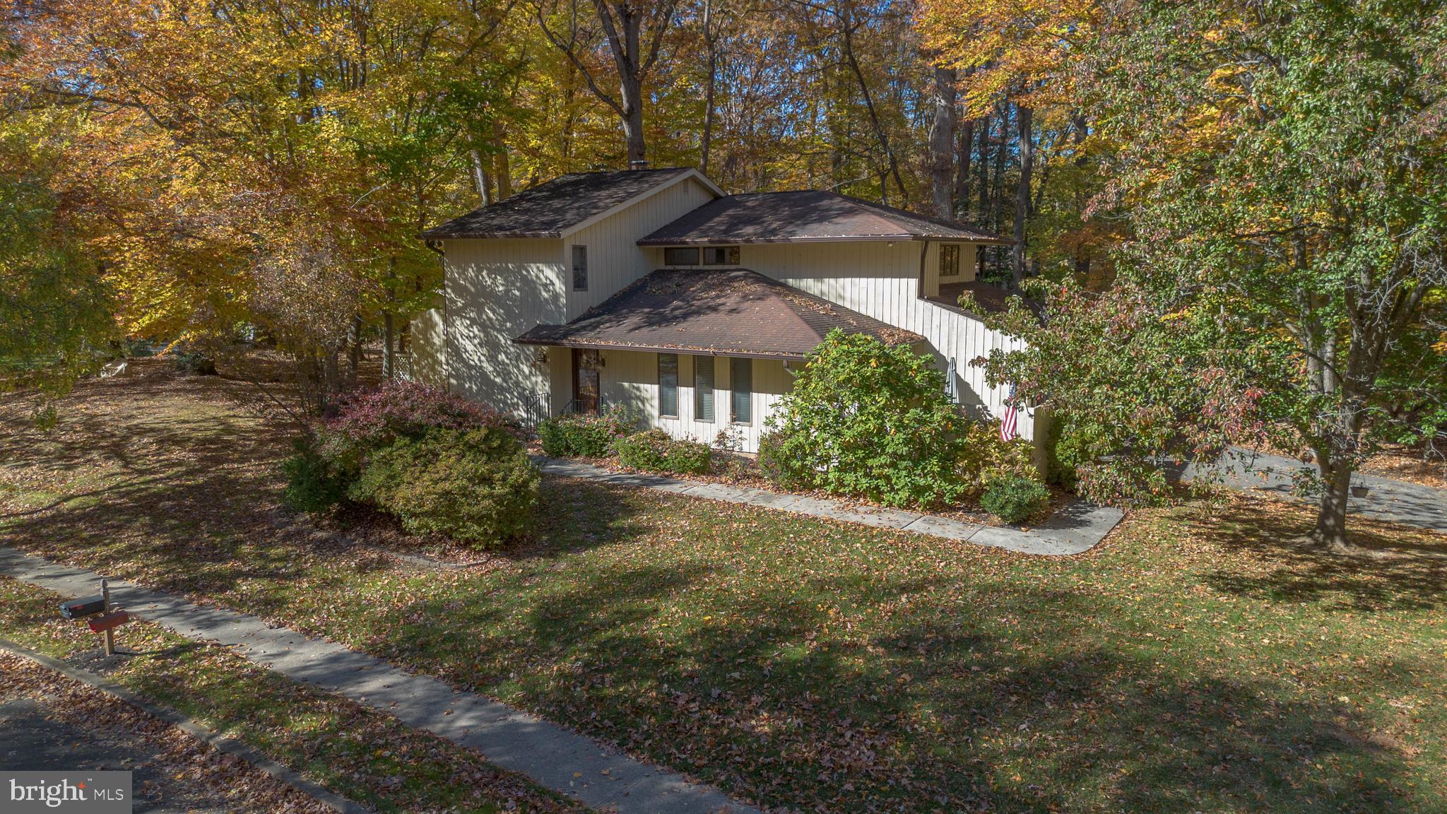 1737 Point Drive, Unit POINT Annapolis, MD 21401 - Photo 22 of 22 a front view of a house with a yard and fountain
