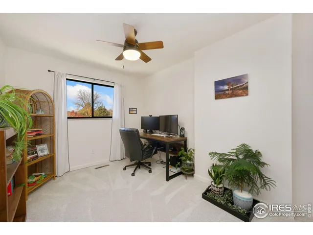 a workspace with a bookshelf