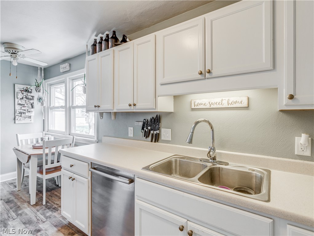 2700 Midvale Road Northwest Canton, OH 44708 - Photo 11 of 24 The kitchen has newer style cabinet doors and knobs, along with a new floor. The dishwasher is 3 years old.
