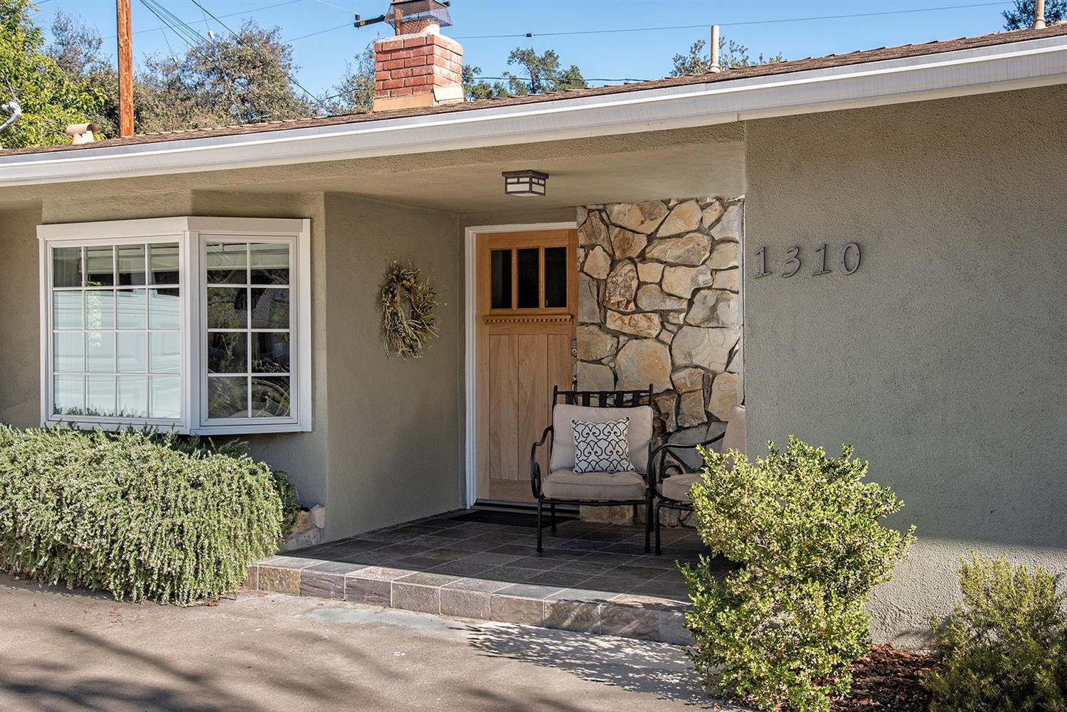 1310 Daly Road Ojai, CA 93023 - Photo 1 of 18 a front view of a house