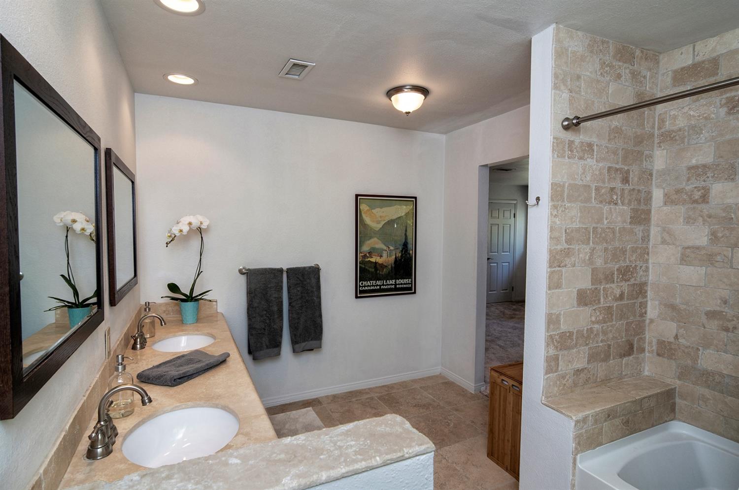1310 Daly Road Ojai, CA 93023 - Photo 12 of 18 a bathroom with a sink toilet and shower