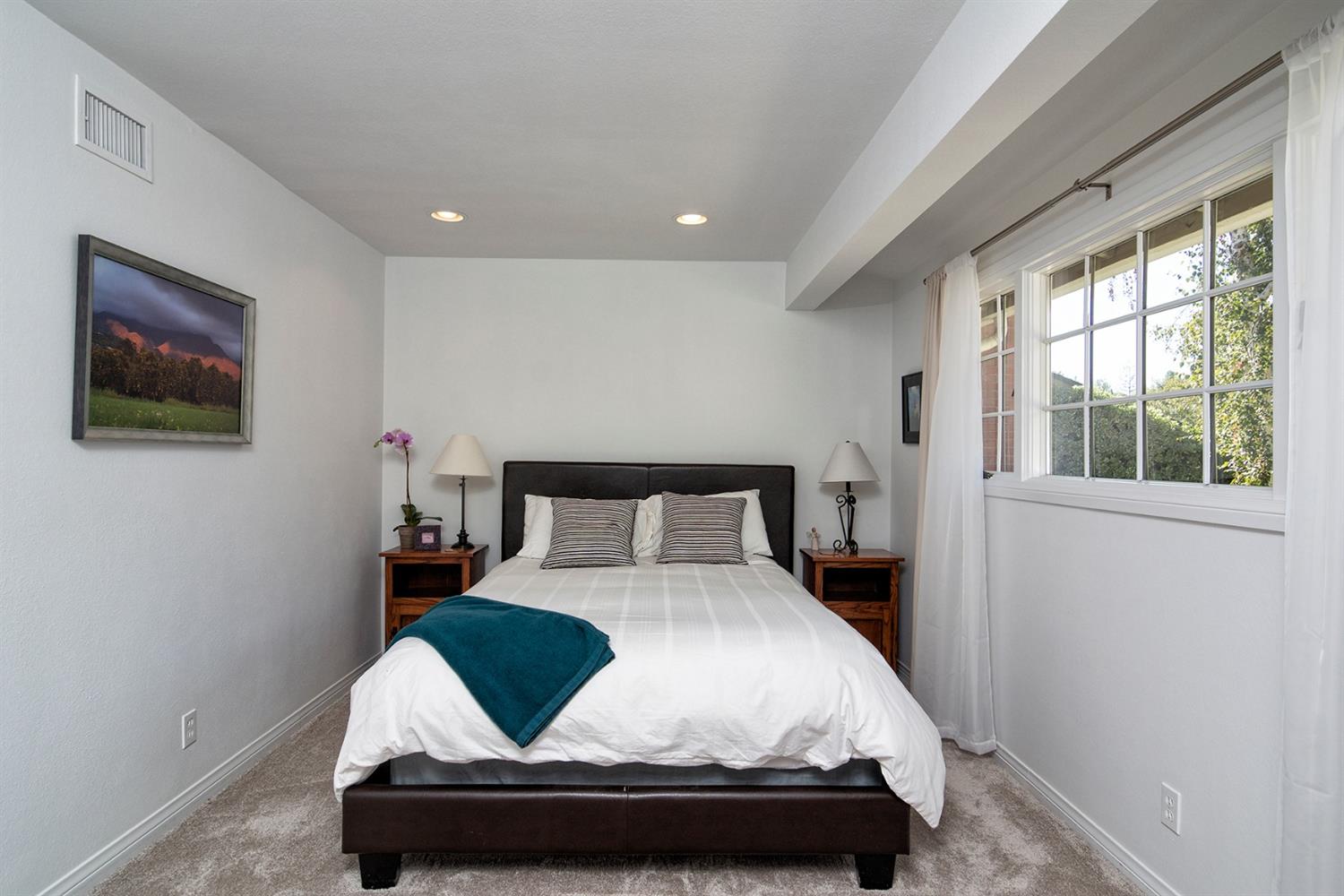 1310 Daly Road Ojai, CA 93023 - Photo 13 of 18 a bedroom with a bed and window