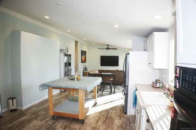 a room with furniture and a flat screen tv